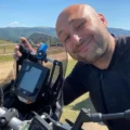 Dragos with his adventure motorcycle in the mountains