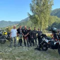 Group of adventure riders with their motorcycles in the mountains